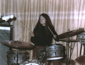 Debi Pomeroy playing drums